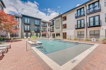 Swimming pool with spa and paver deck